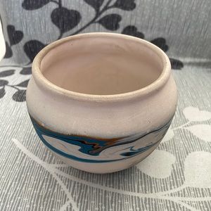 Hand made pottery by Nemadji. 4 inches tall 4 inch round opening. Great accent